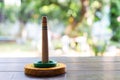 Quoits, wooden toy on wooden texture in bokeh garden background, Selective focus, Close up shot, Game and Recreation for children