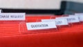Quotation business document file on office cabinet
