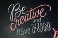 Quote - Be creative and have fun- on black chalkboard handwritten by color chalks with hand