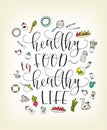 Quote Healthy food - healthy life. Lettering. Elements of food and kitchen utensils.