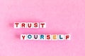 Quote Trust yourself made out of colorful beads