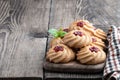 Qurabiya cookie shortbread with jam on rustic wooden table Royalty Free Stock Photo