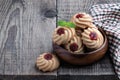 Qurabiya cookie shortbread with jam on rustic wooden table Royalty Free Stock Photo