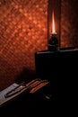 Quran and Islamic prayer beads in a rustic house room