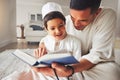 Quran, Muslim dad or happy child praying for worship, muslim pray and faith in Allah, god or holy spirit. Child Royalty Free Stock Photo