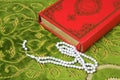 Quran, rosary beads. Royalty Free Stock Photo