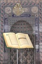 Quran, on a wooden stand in mosque. Royalty Free Stock Photo