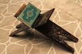 Quran on a wooden stand in mosque. Royalty Free Stock Photo