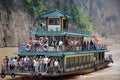 Tourists on boat at Qutang gulches at three gorges at yangtze river