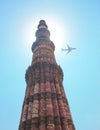 Qutub Minar and Flight in the sky, New Delhi, India