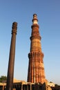 Qutub minar with iron pillar Royalty Free Stock Photo