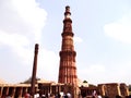 Qutub Minar & Iron Pillar in Qutub complex, one of Delhi`s most curious structures
