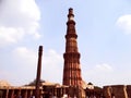 Qutub Minar & Iron Pillar in Qutub complex, one of Delhi`s most curious structures