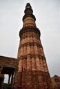 Qutub Minar New Delhi, India, The tallest minaret in India is a marble and red sandstone tower that represents the beginning of Royalty Free Stock Photo