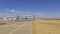 Quwaira Solar Plant named after UAEÃ¢â¬â¢s Sheikh Zayed entrance gate, taken from public access road.