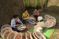 Quy Nhon, Vietnam - Oct 22, 2016: Women making conical hat in village in Quy Nhon