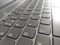 Qwerty keyboard for office use, keypad of a laptop, sideview of keypad of a laptop