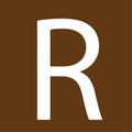 r letter on brown background