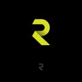 R logo. R monogram. Yellow origami letter isolated on a dark background.