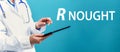 R Nought theme with a doctor using a tablet Royalty Free Stock Photo