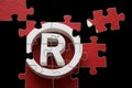 R trademark - puzzle incomplete Royalty Free Stock Photo