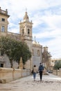 Limestone pathway passage leading to St Paul\'s basilica in Rabat, Malta