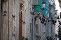 Rabat medieval village street view building in Malta painted bow windows