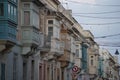 Rabat medieval village street view building in Malta painted bow windows