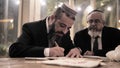 Rabbi filling in the final details of a ketubah