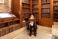Rabbi and holy books in synagogue.