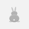 Rabbit. Back view. Gray animal, white tail. Vector. A single element of decor