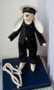 Rabbit doll in a naval officer uniform. Royalty Free Stock Photo