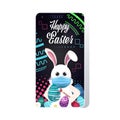 Rabbit drawing on eggs happy easter bunny spring holiday concept greeting card lettering smartphone screen mobile app