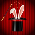 Rabbit ears appearing from magician hat, magic trick Royalty Free Stock Photo