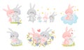 Rabbit Family with Bunny Mom and Dad Nursing Their Cubs Vector Set