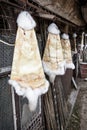 Rabbit furs hanging on the hooks in the farm, rural scene Royalty Free Stock Photo