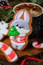 Rabbit Gingerbread Cookie on Wooden Background, Handmade Christmas Treat Royalty Free Stock Photo