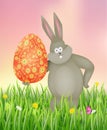 Rabbit holding Easter egg.
