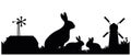 Rabbit mother with cubs are grazing. Picture black silhouette. Farm pets. Fur animals. Isolated on white background