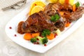 Rabbit pan with potato dumplings and vegetables Royalty Free Stock Photo