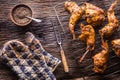 Rabbit. Roasted rabbit slices with american potatoes garlic spices salt,pepper cumin and draft beer. Hunting cuisine Royalty Free Stock Photo