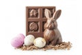 rabbit shaped chocolate with easter eggs isolated white Royalty Free Stock Photo