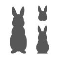 Rabbit silhouettes collection. Standing, sitting bunny and rabbit head illustration for Easter decorations. - Vector Royalty Free Stock Photo