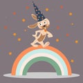 Rabbit wizard in a hat with stars. A cute cartoon rabbit walking forward on a rainbow