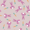 Rabbits with carrots. Seamless vector pattern. Animal background