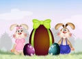 Rabbits with chocolate Easter eggs Royalty Free Stock Photo