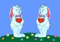 Rabbits with hearts on a meadow Royalty Free Stock Photo