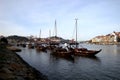 Rabelo boats with port wine casks in picturesque scenery in Porto