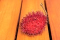 Fantastic Rambutan fruit isolated on wooden background