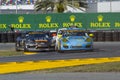 Race action collision of race cars at Daytona Speedway Florida